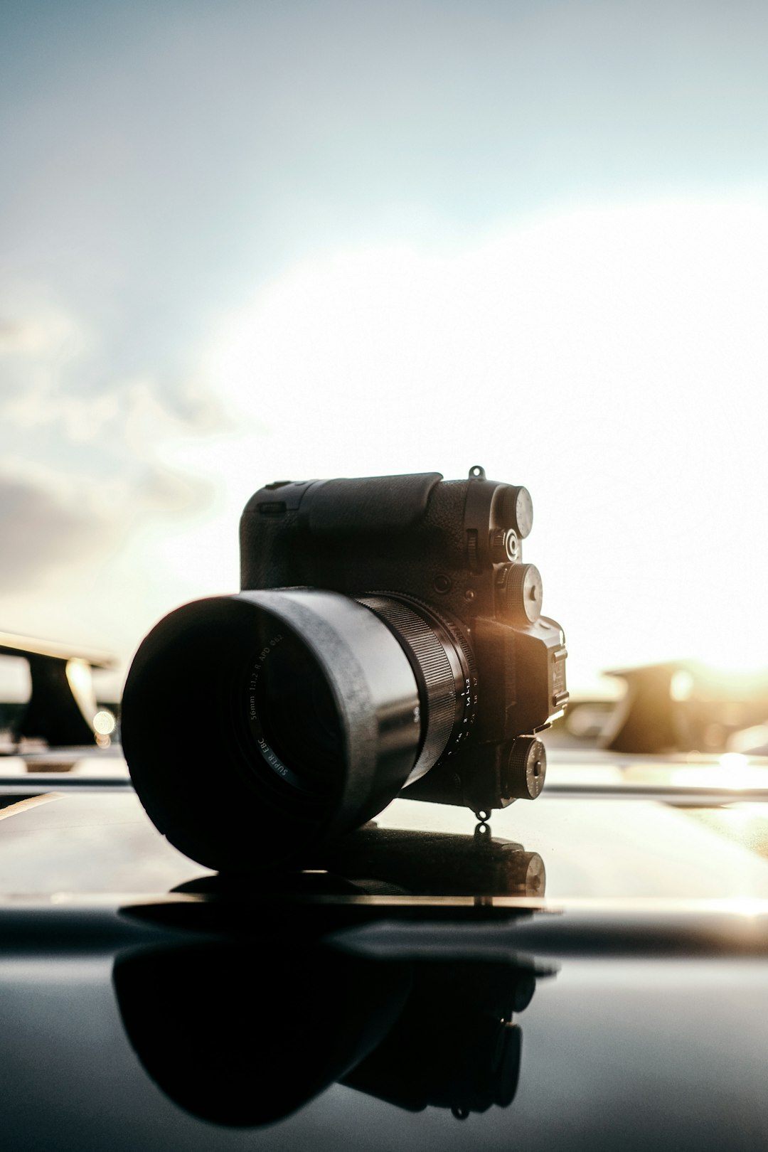 black camera lens on black surface