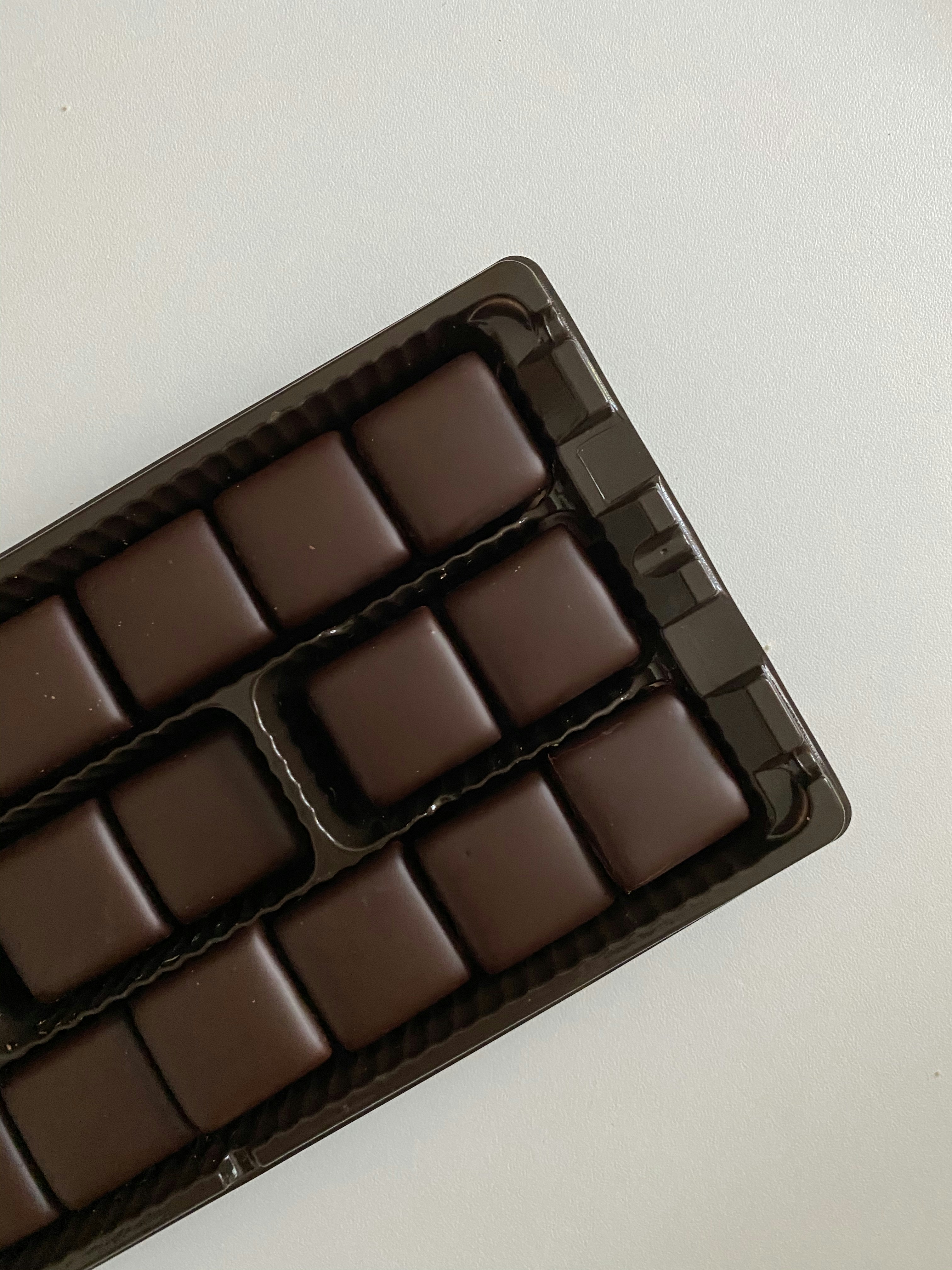 Premium Belgian chocolate box dark background