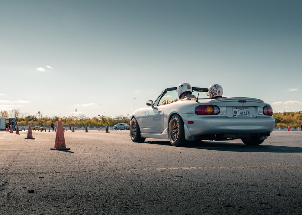 white porsche 911 on road during daytime