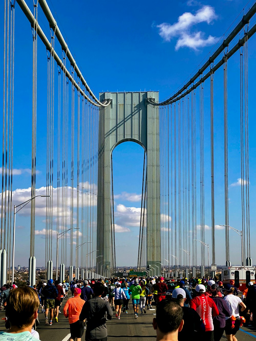 people walking on bridge during daytime