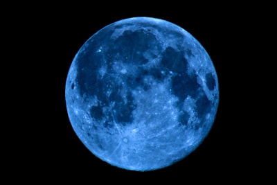 blue moon with black background outer-space teams background