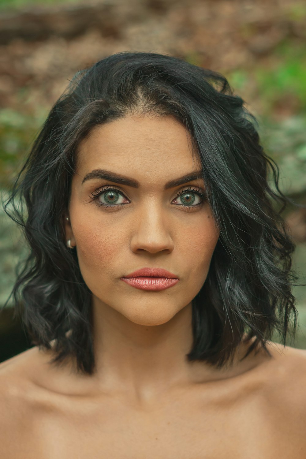 woman with black hair and red lipstick