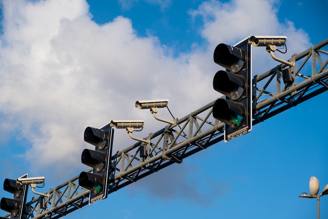 traffic light under blue sky during daytime