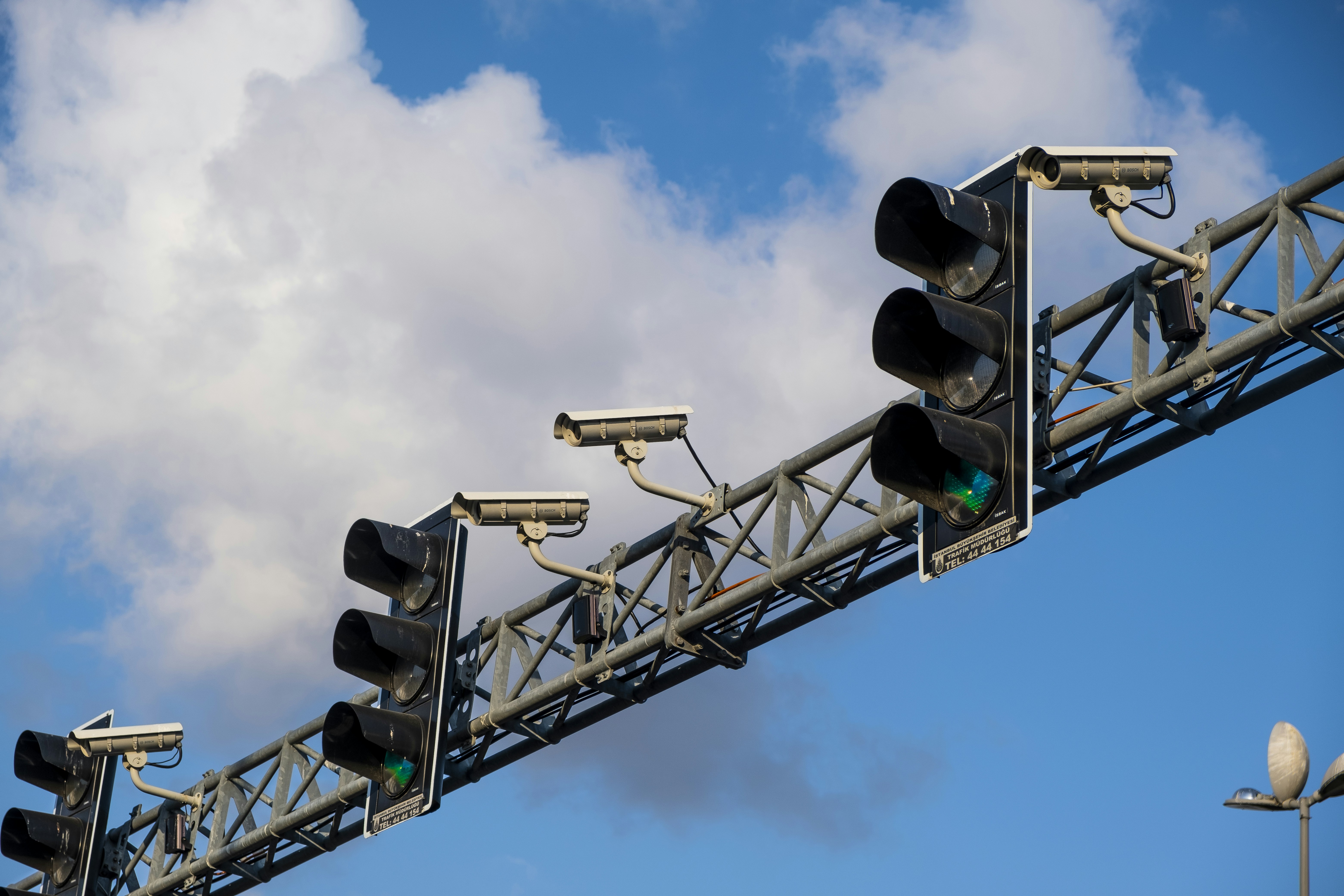traffic light under blue sky during daytime