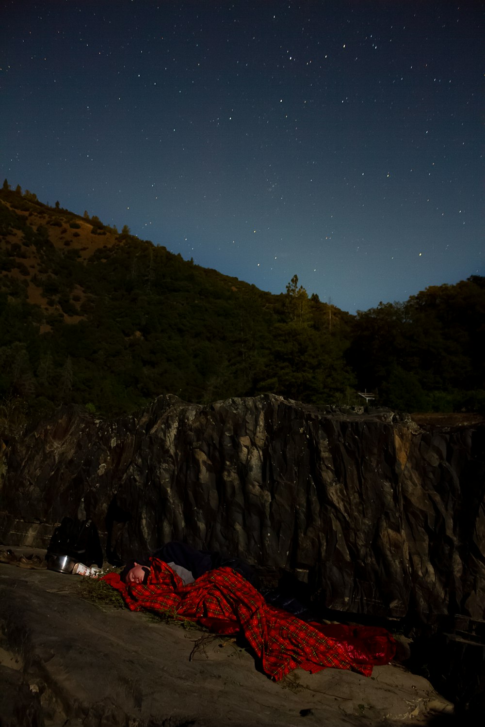 red textile on gray rock mountain during daytime