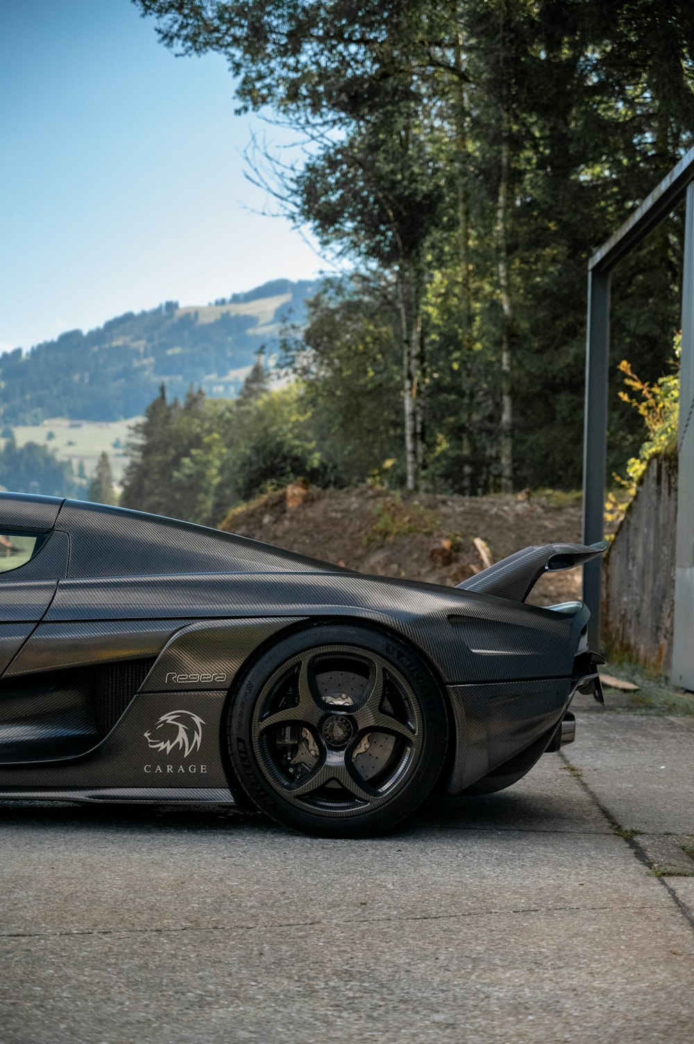 black porsche 911 parked on road during daytime