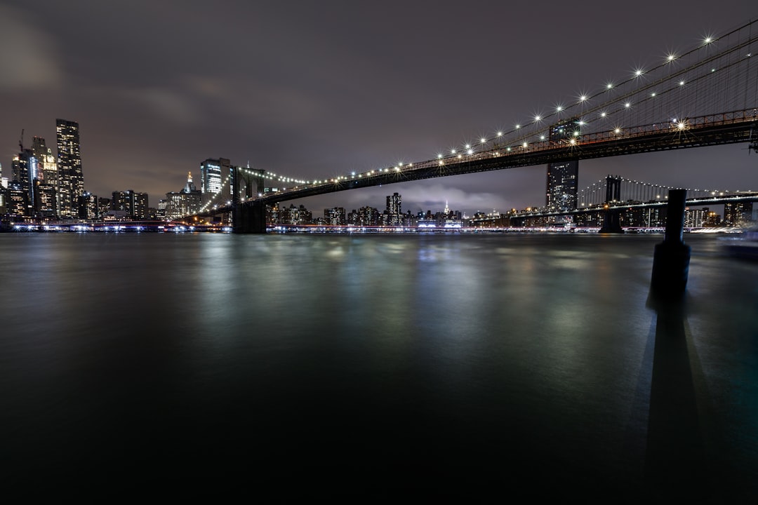 bridge over water during night time