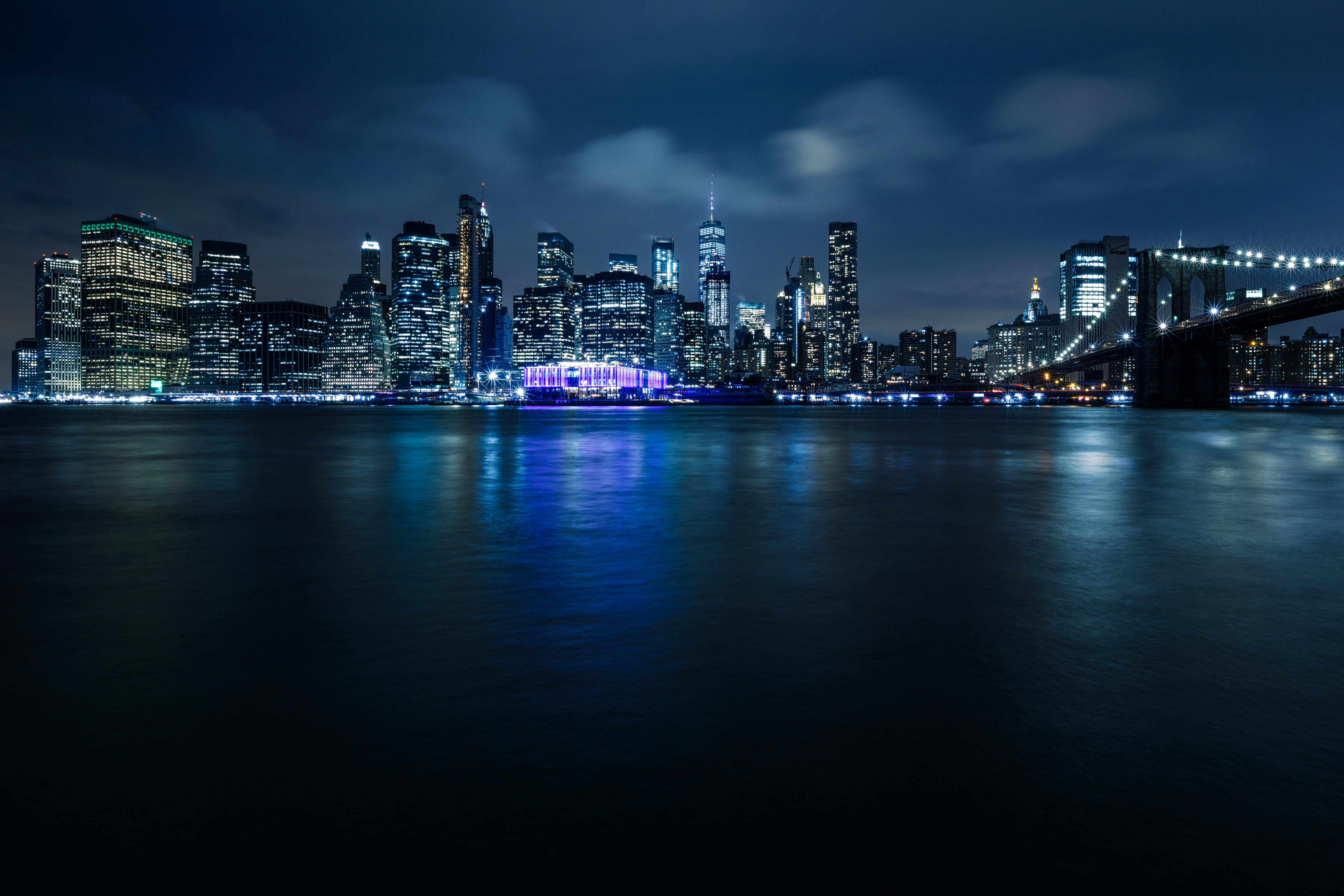 city skyline during night time