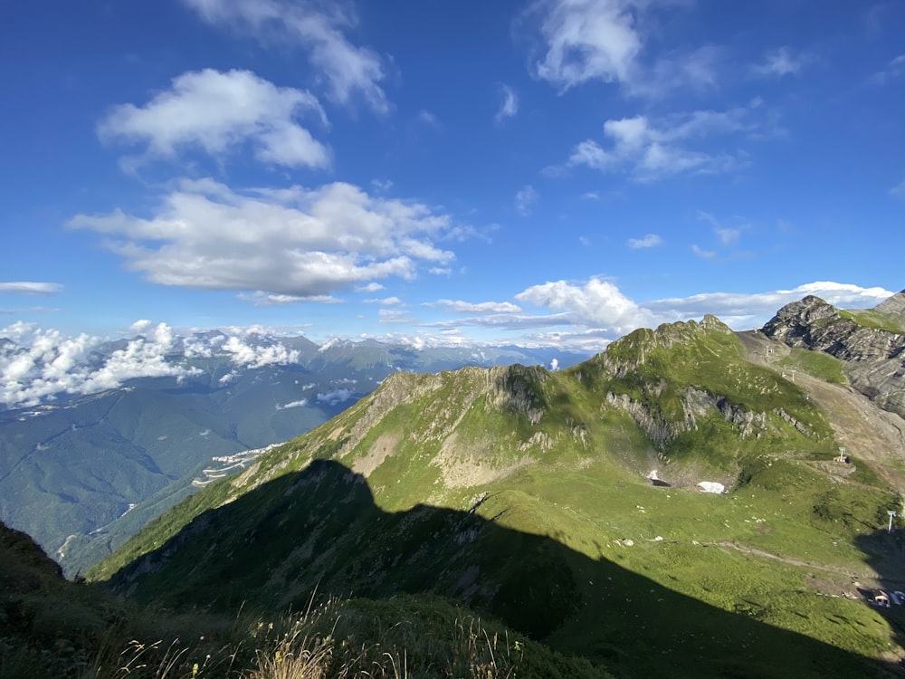 green mountains under blue sky during daytime