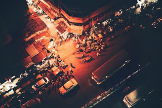 people walking on street during night time