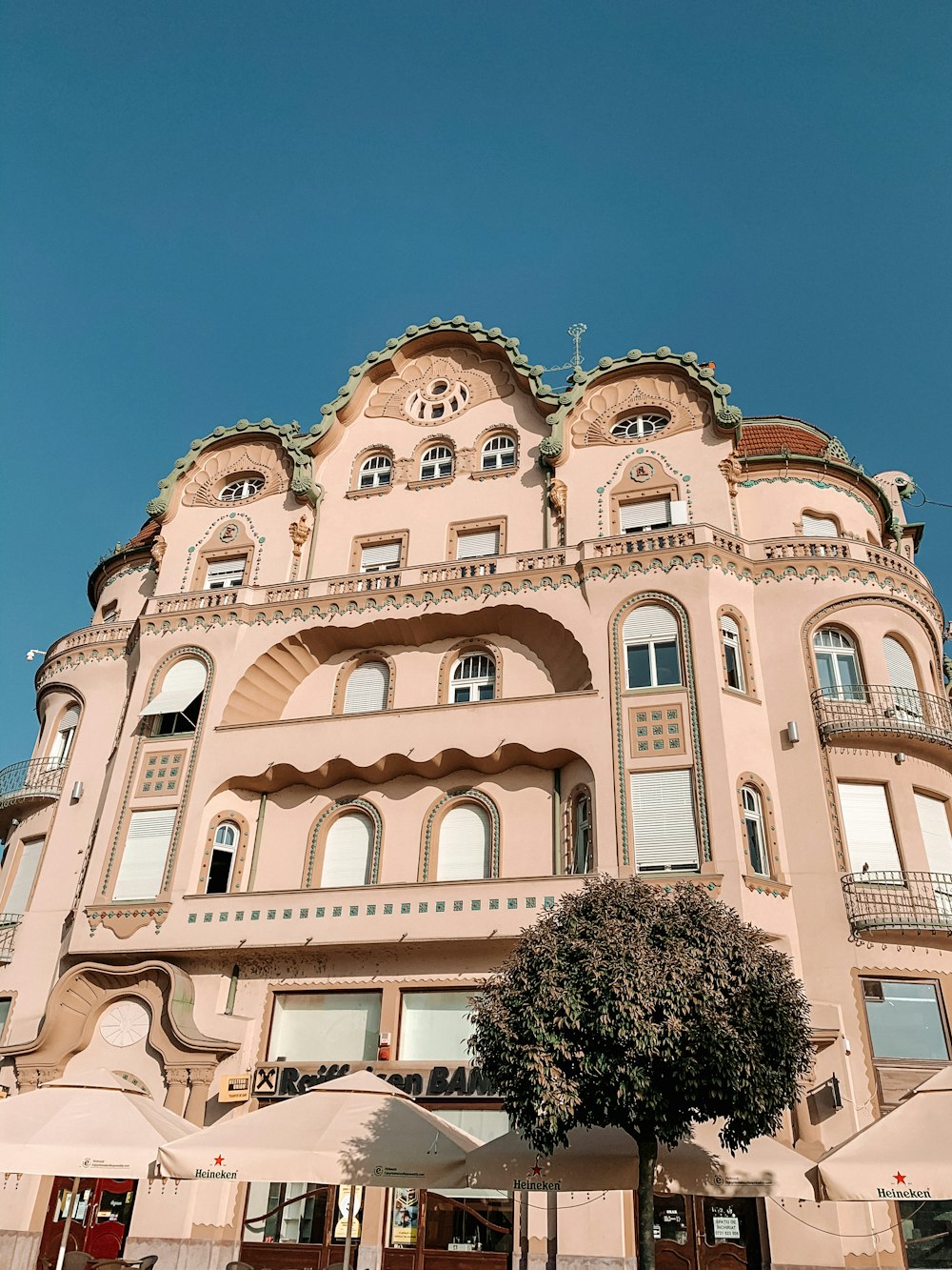 brown concrete building under blue sky during daytime