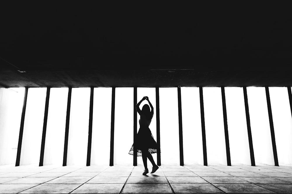 silhouette of woman walking on wooden floor photo – Free Person Image ...