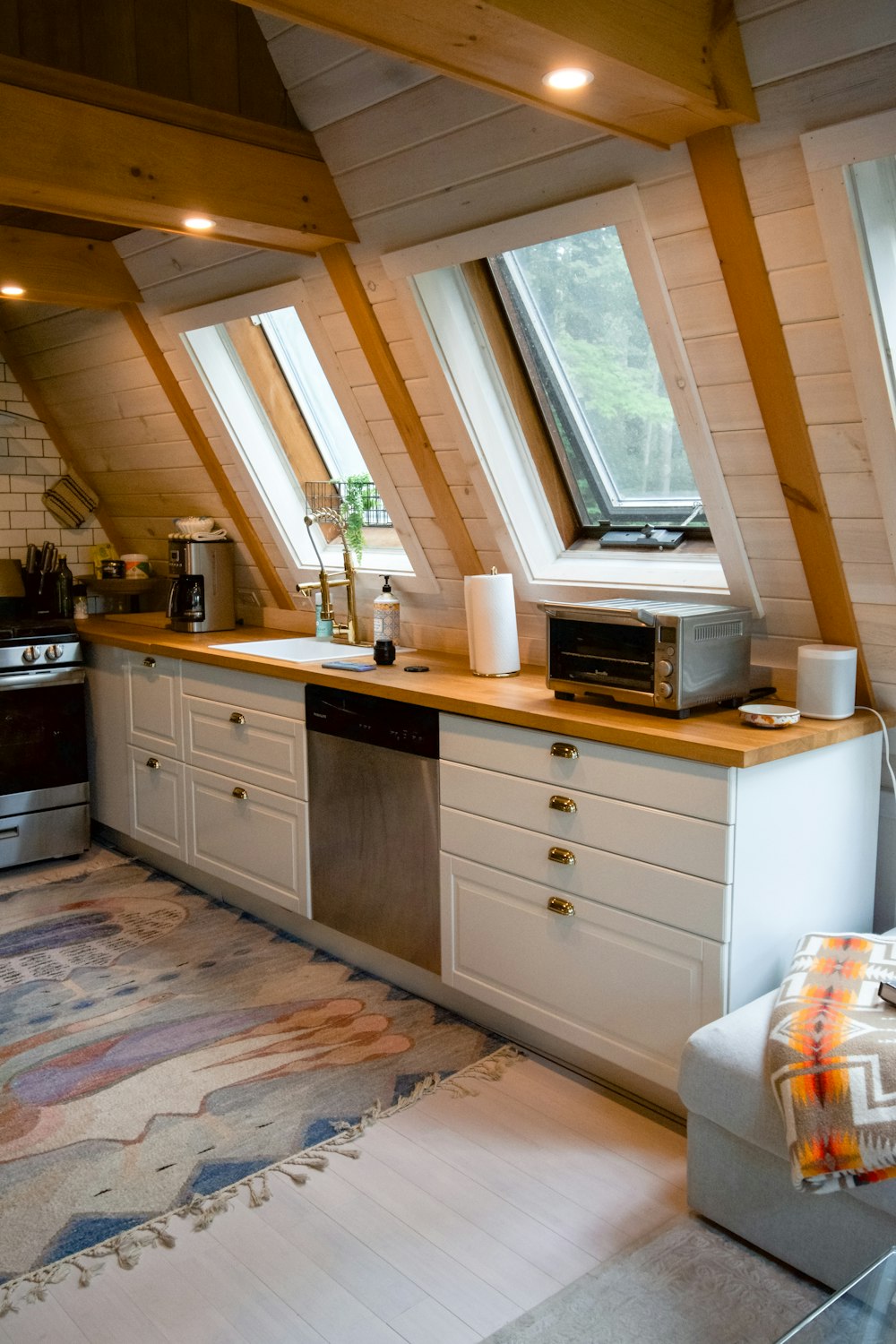 white microwave oven on white wooden cabinet