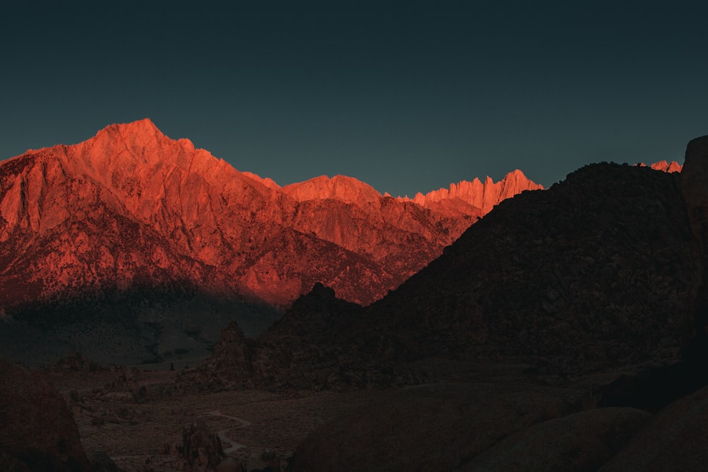 brown mountains under blue sky during daytime