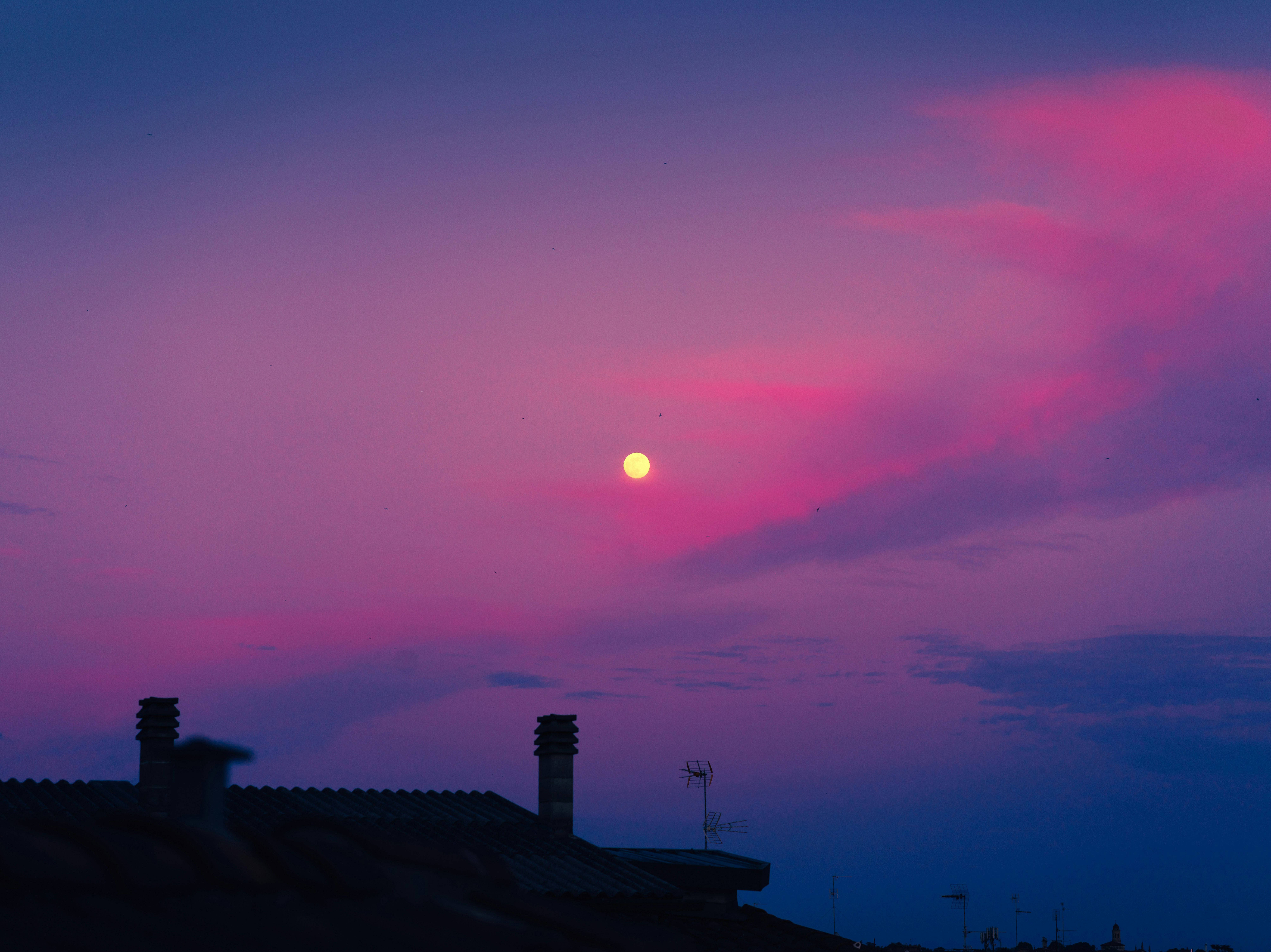 silhouette of building during sunset