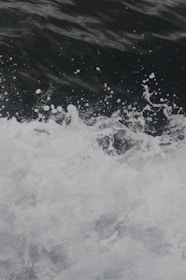 Animated water waves clashing gently, symbolizing the Black Seas Communications brand.