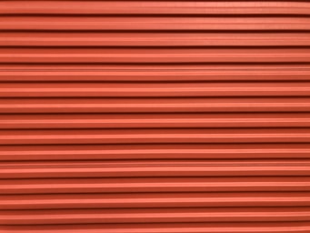 red and black striped textile