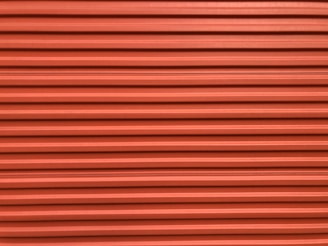 red and black striped textile