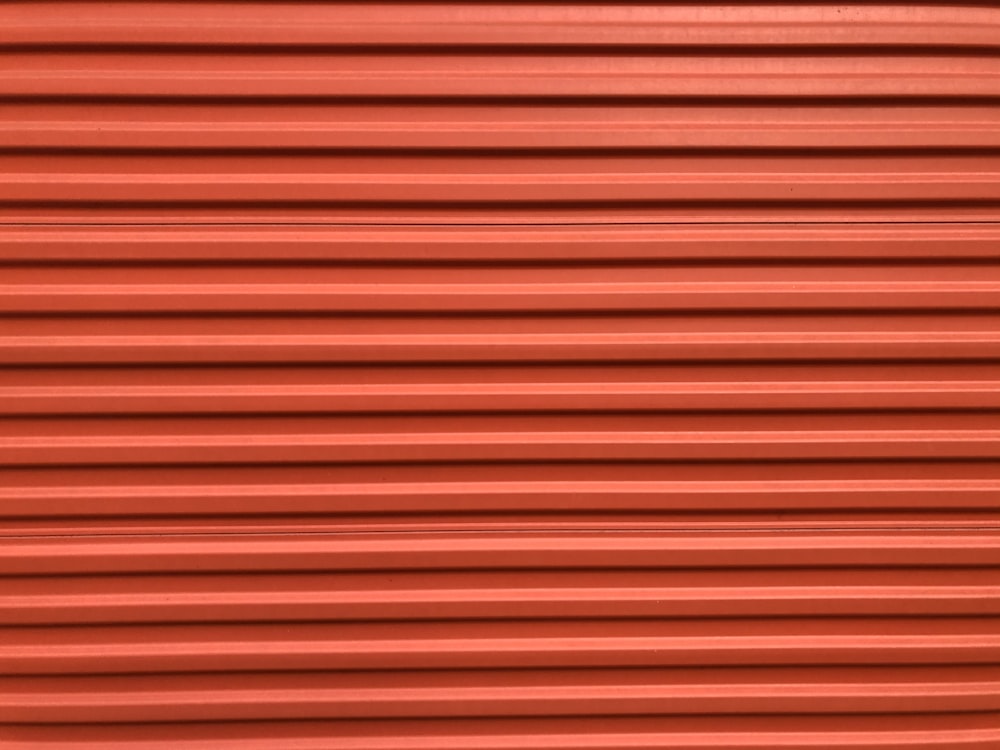 red and black striped textile