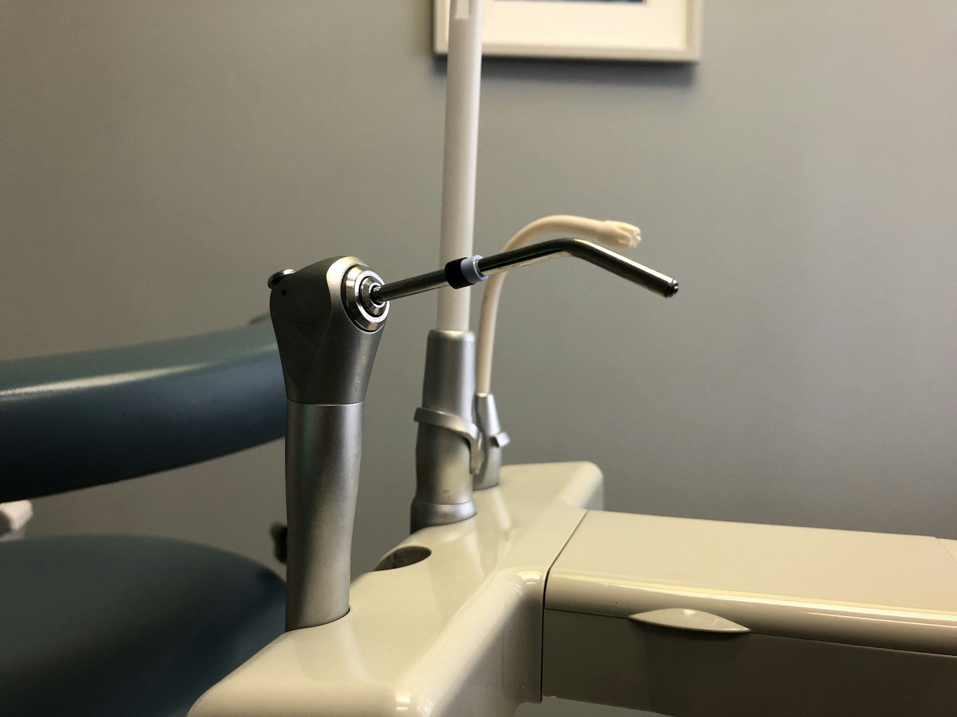 stainless steel faucet on white ceramic sink
