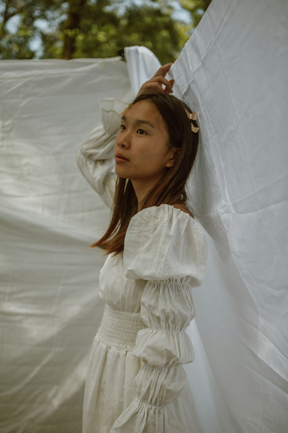 girl in white dress standing