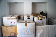 brown cardboard boxes on brown wooden table