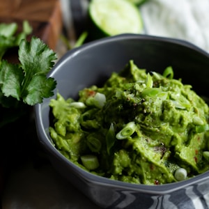 green vegetable in grey ceramic bowl