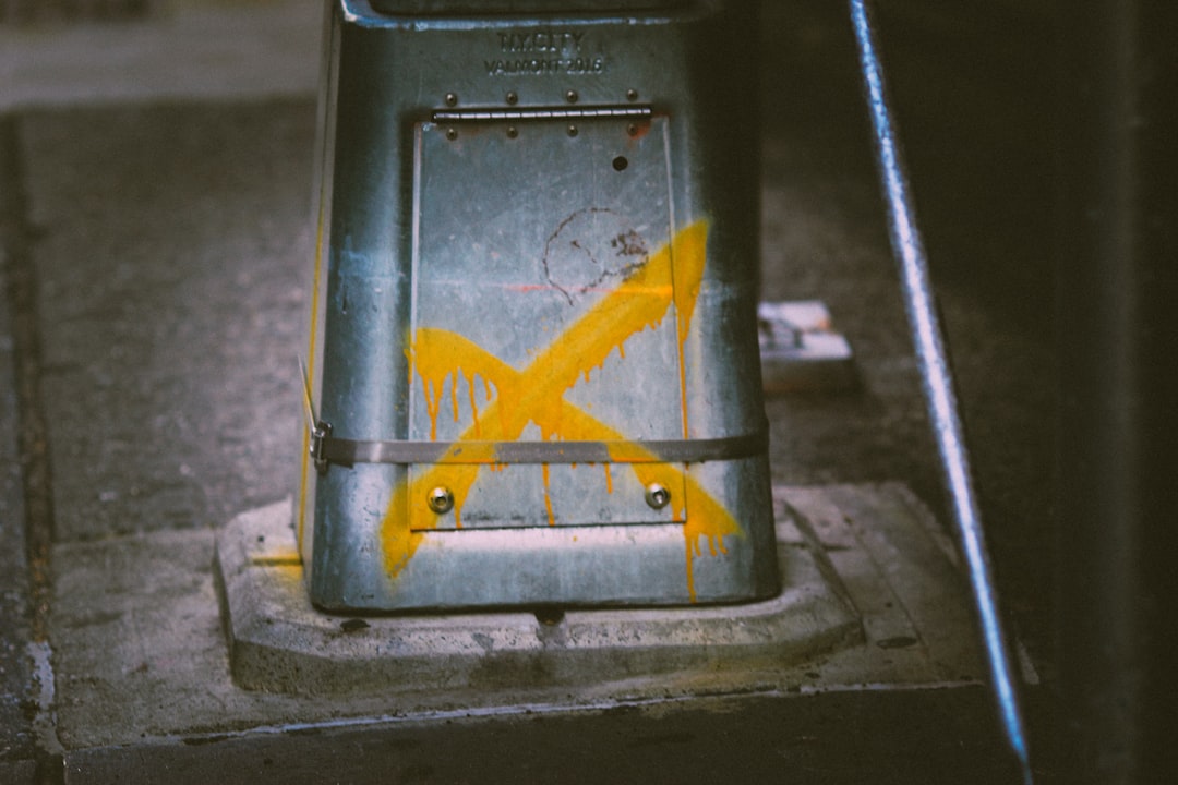 gray and yellow metal container