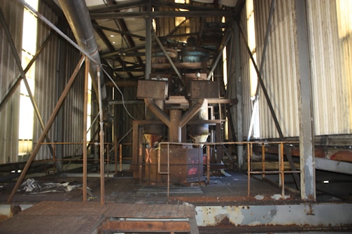 A professional industrial workspace with metal structures.