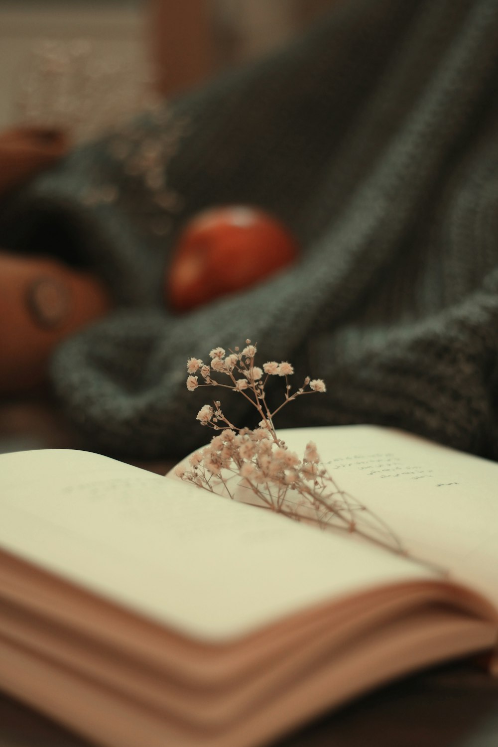 white and green flower on white book page