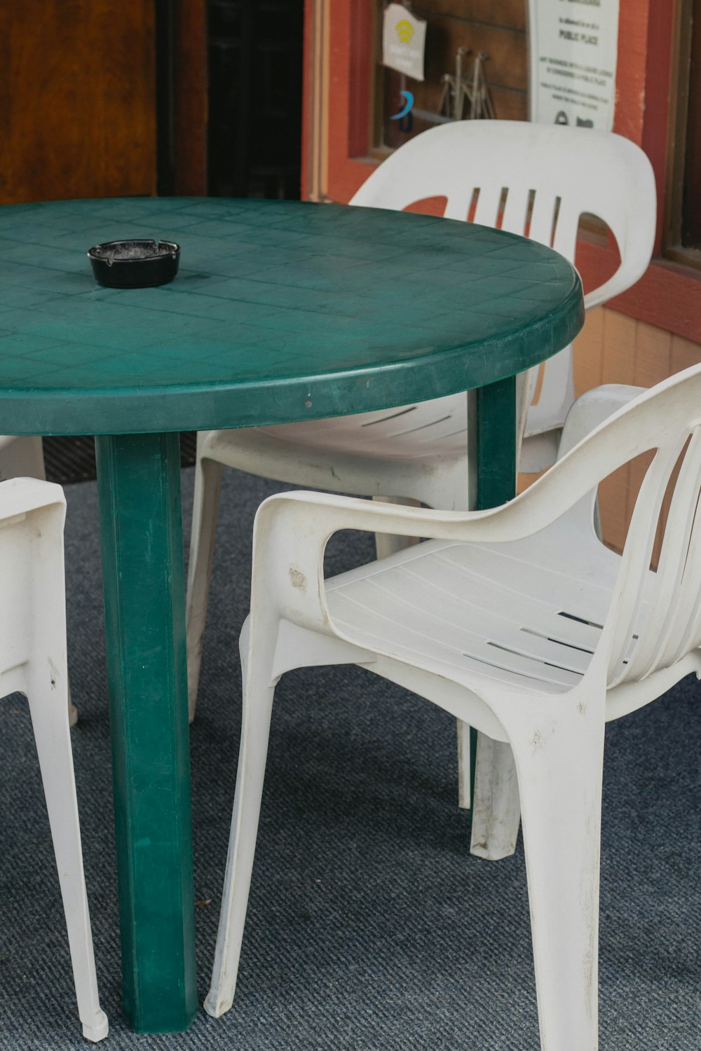 black round plate on green table