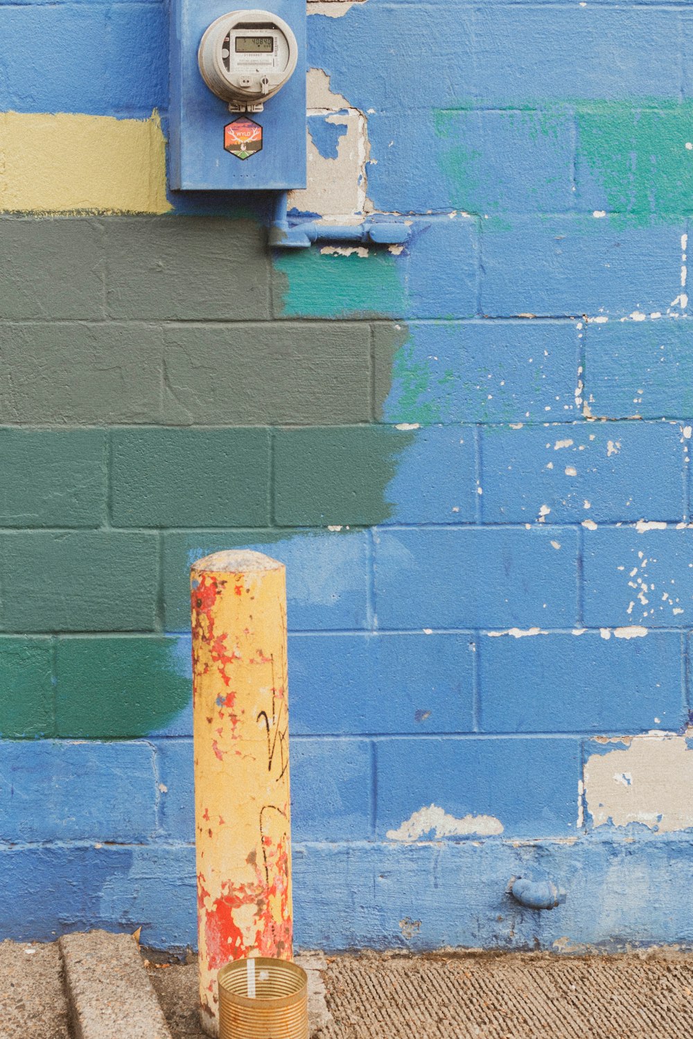 blue brick wall with green wall