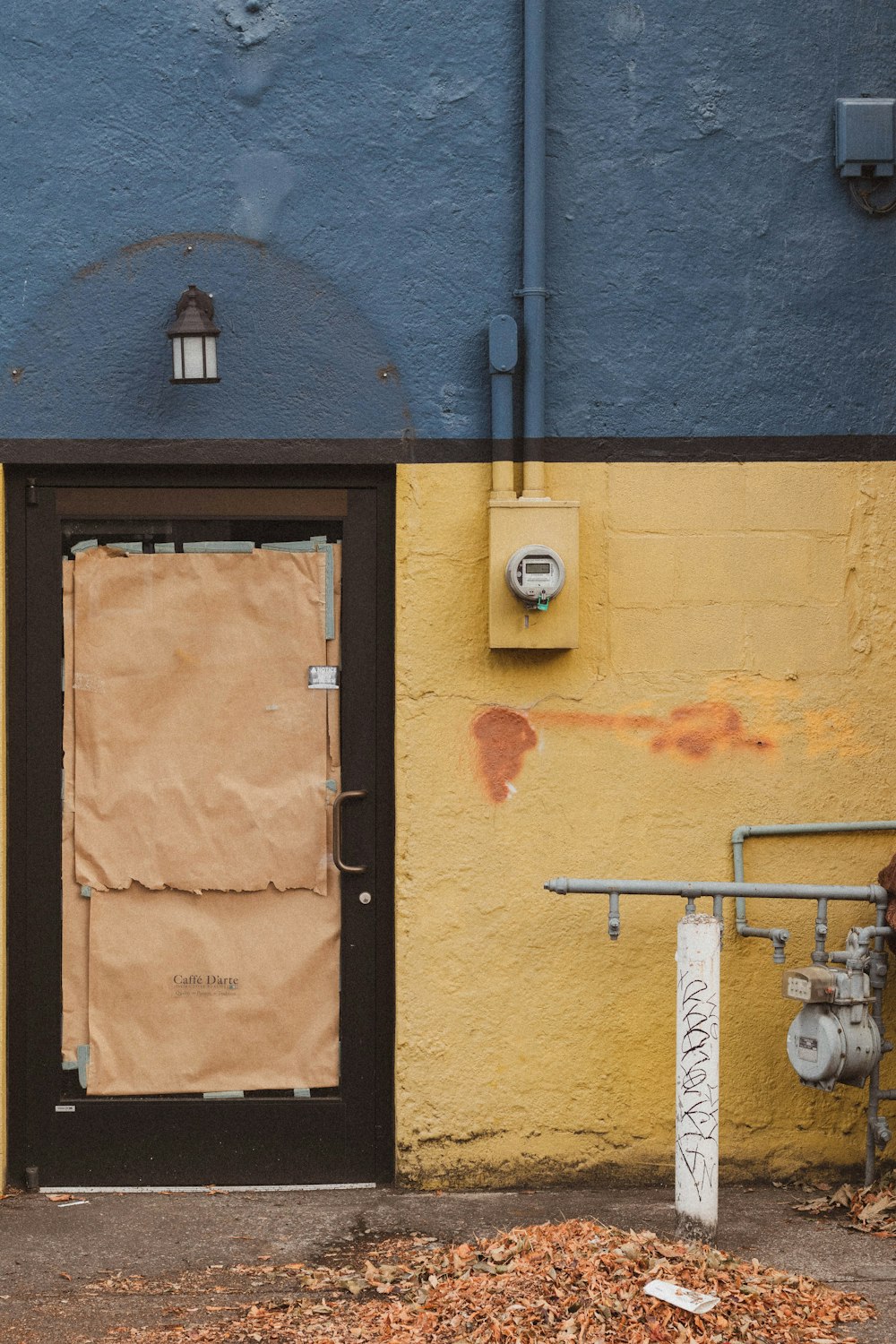 brown and blue wooden door