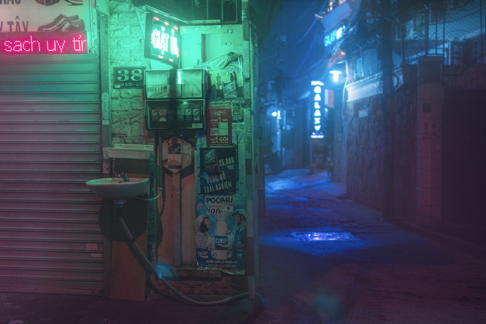 man in black shirt standing near store