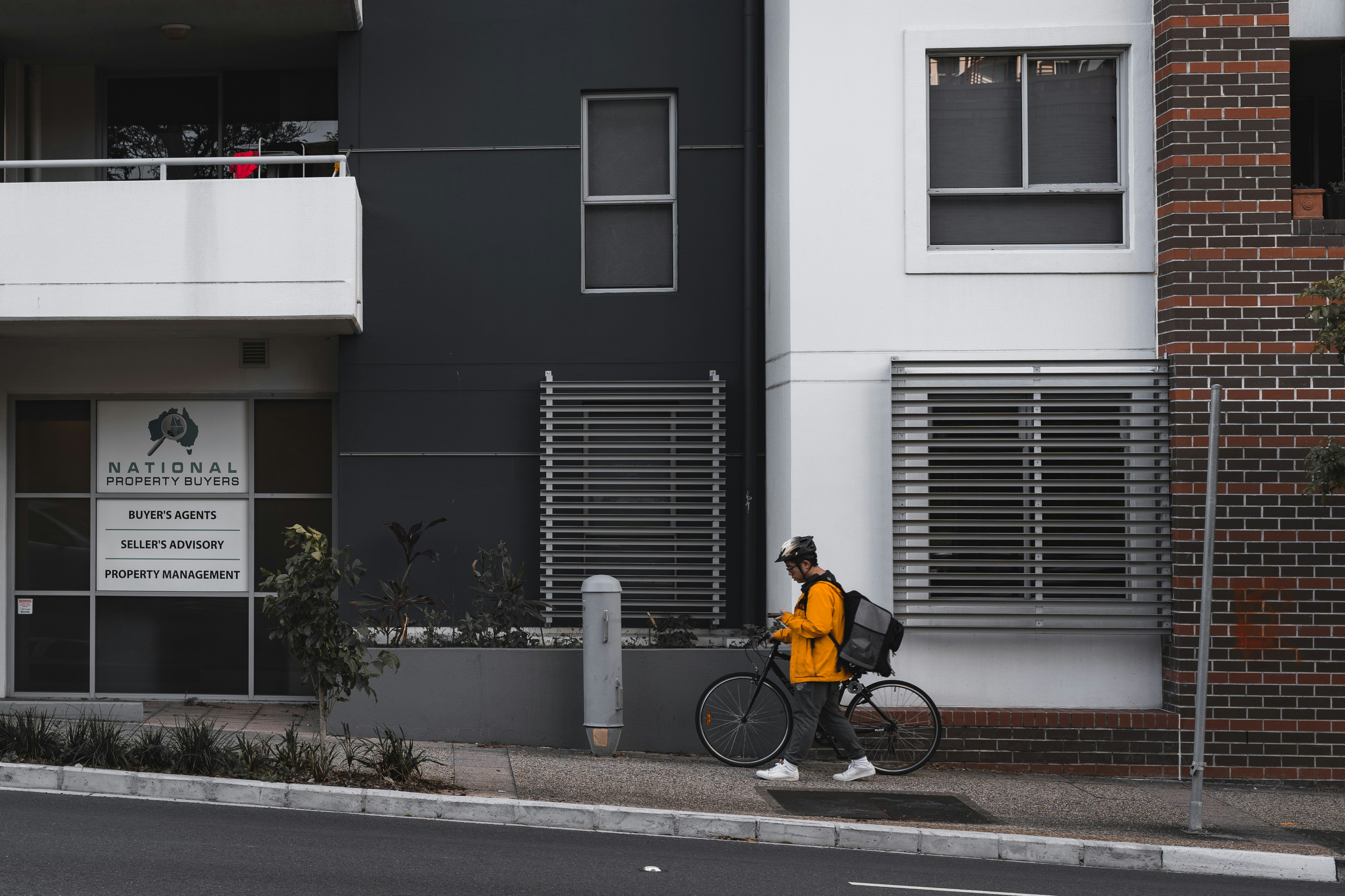 Close-up of a smart delivery robot navigating urban sidewalks with AI and IoT sensors visible
