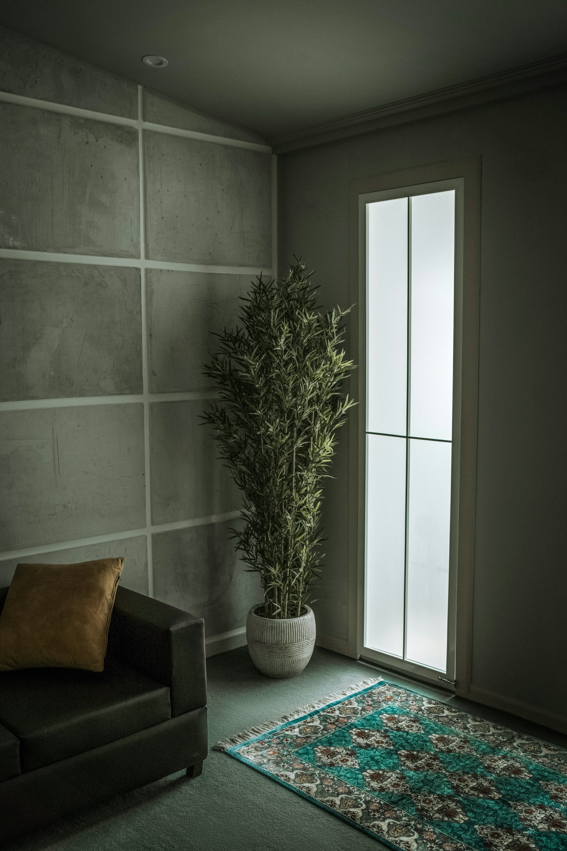 black and brown leather padded tub sofa