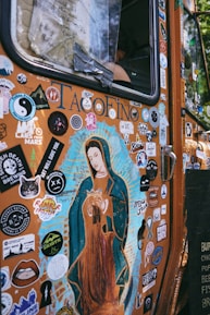 orange and white car with stickers
