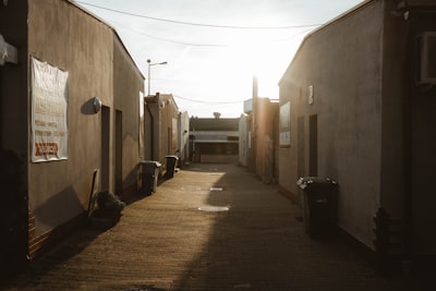 brown concrete building during daytime town teams background