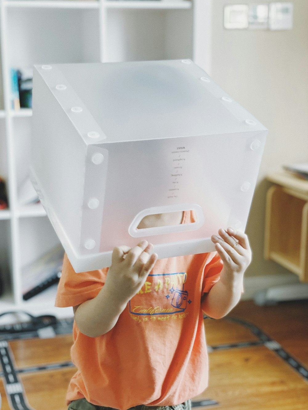 person holding white iphone box