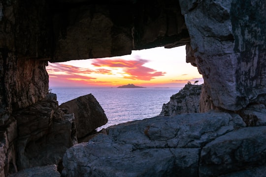 brown rocky mountain near body of water during sunset in Marseille France