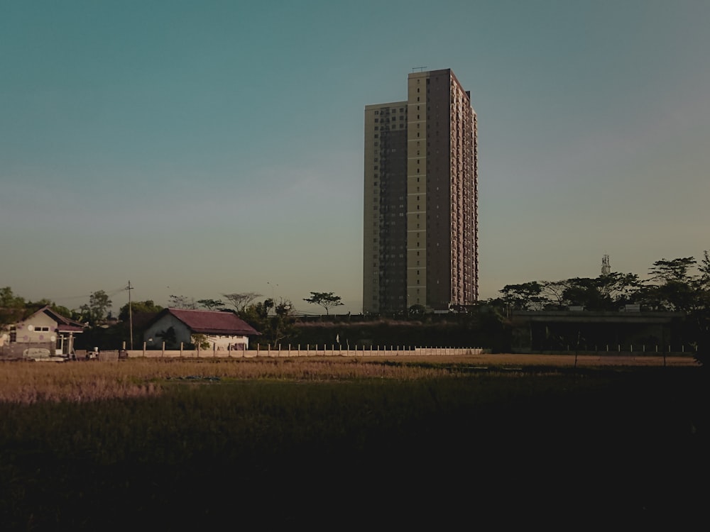 high rise building near body of water during daytime