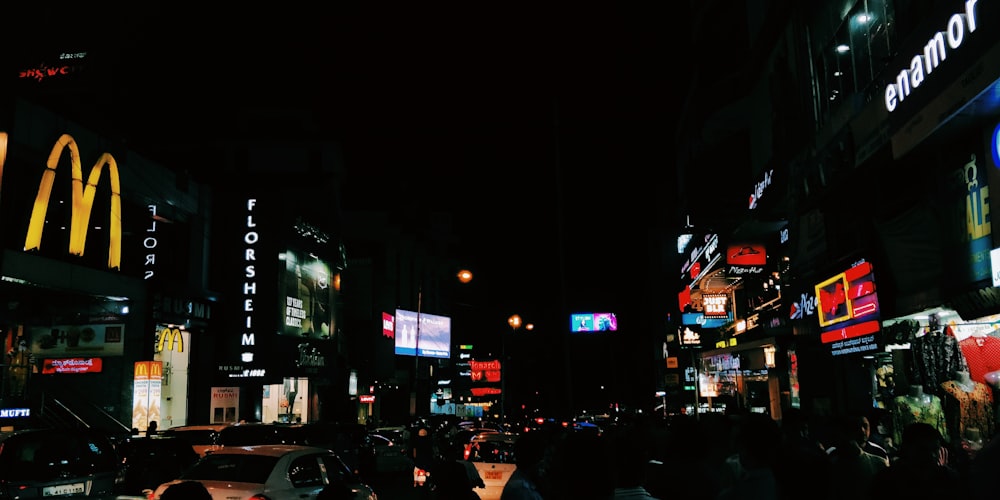 cars parked on street during night time