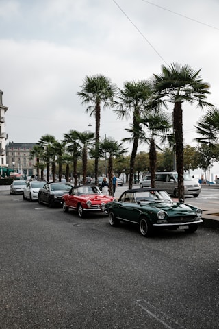 cars parked on parking lot during daytime