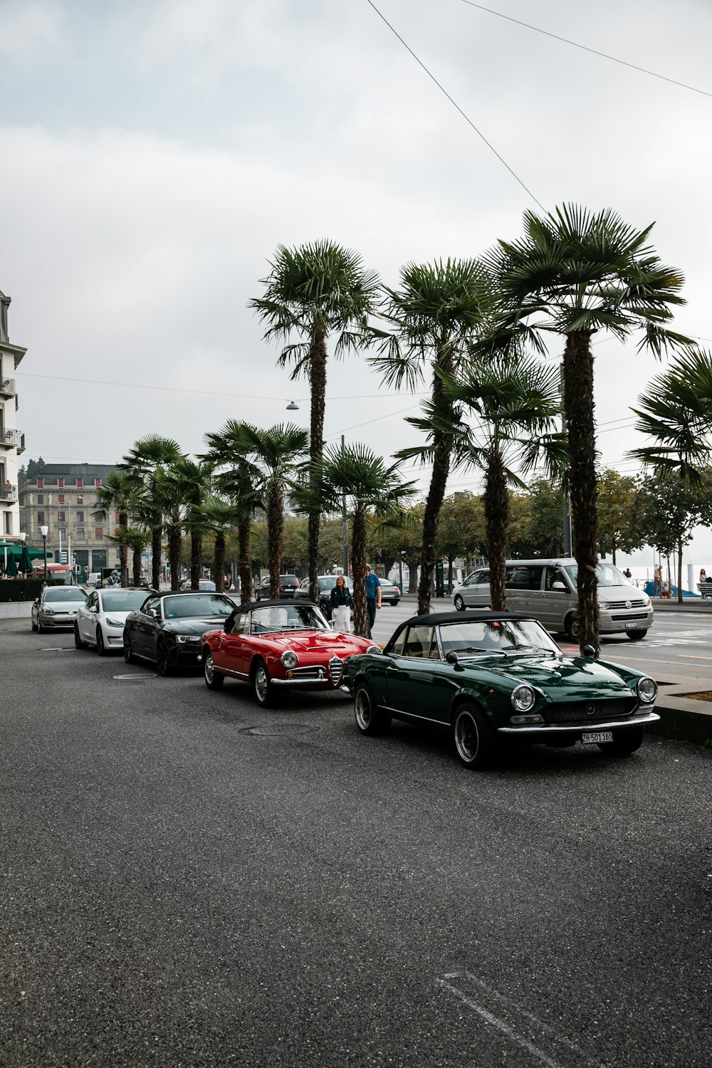 cars parked on parking lot during daytime