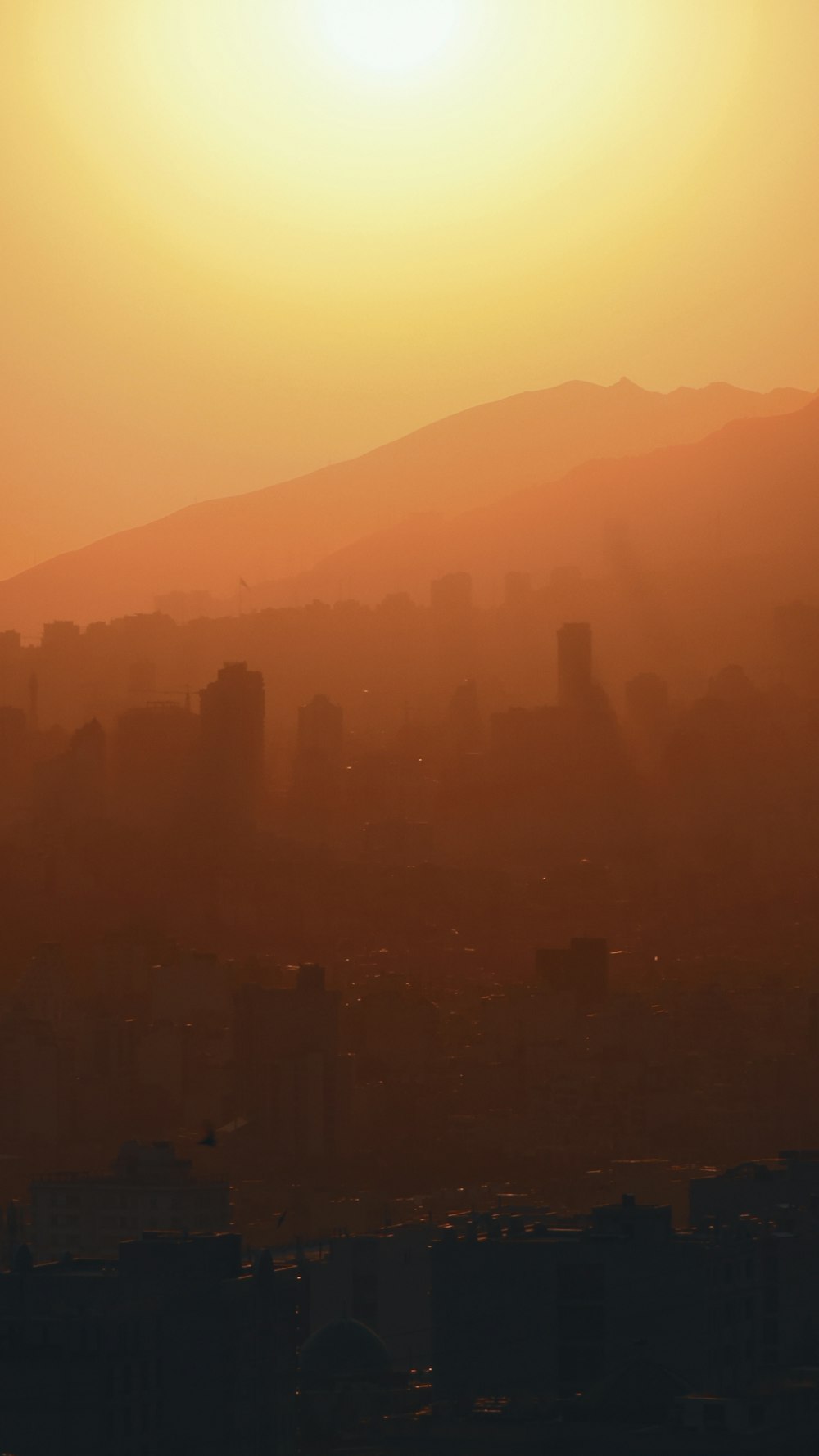 silhouette of mountain during sunset