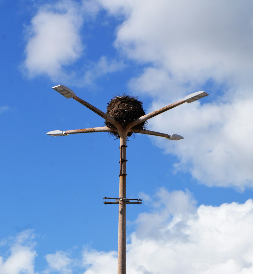 brown wooden cross under blue sky during daytime