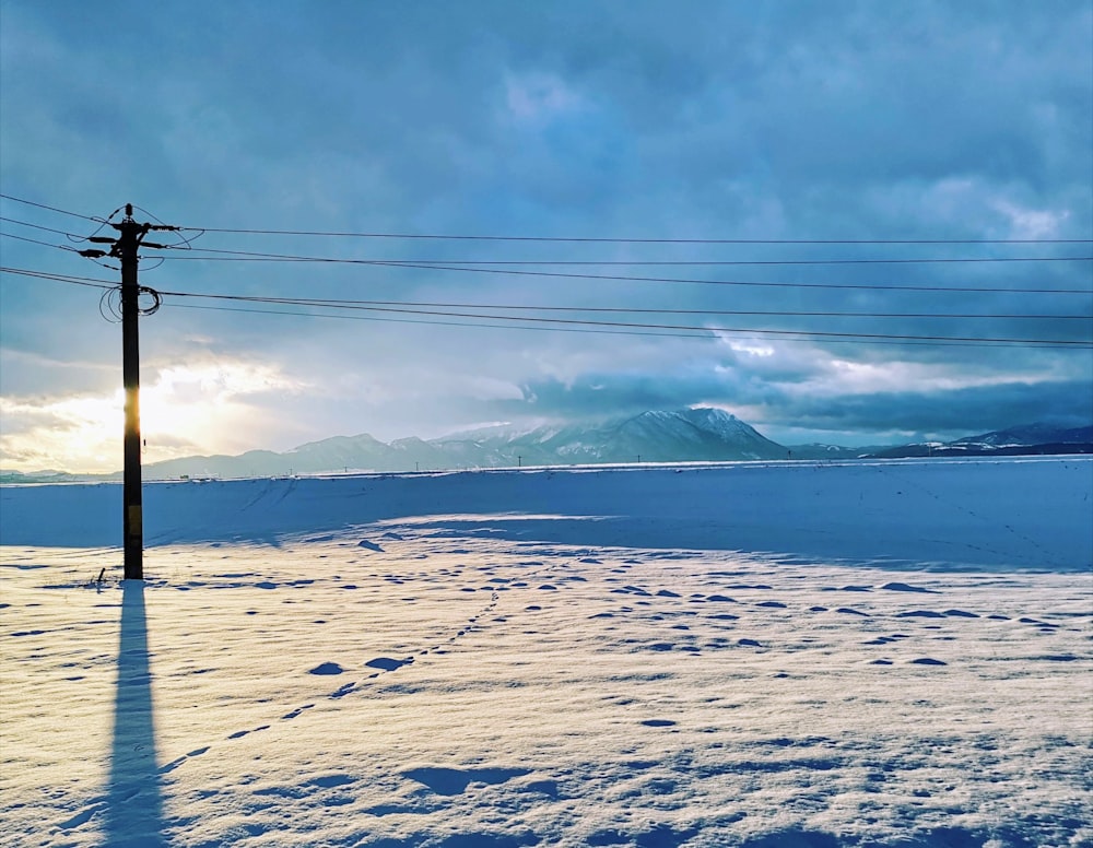 snow covered mountains under blue sky during daytime