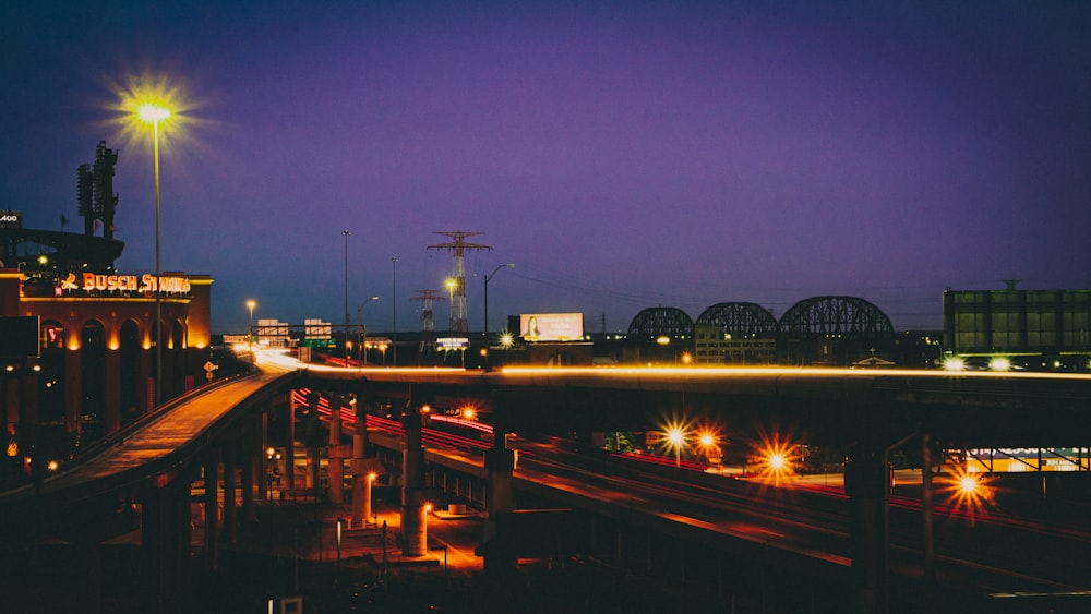 city with lights turned on during night time