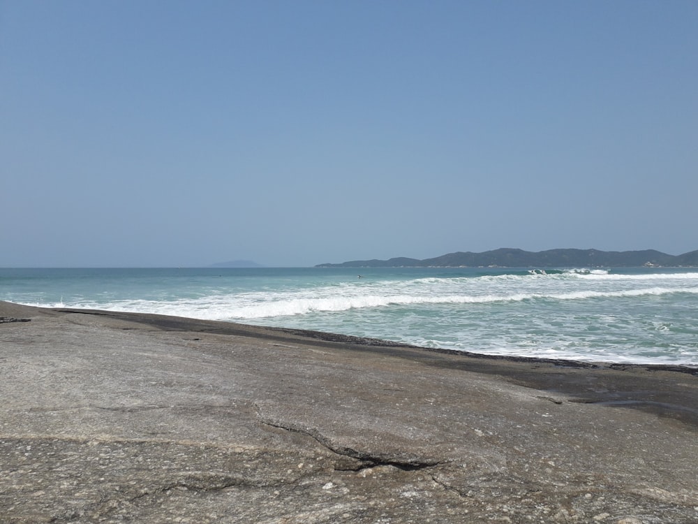 blue sea under blue sky during daytime