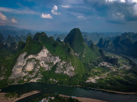 Lush landscapes and vibrant culture of South America with mountains and colorful markets.